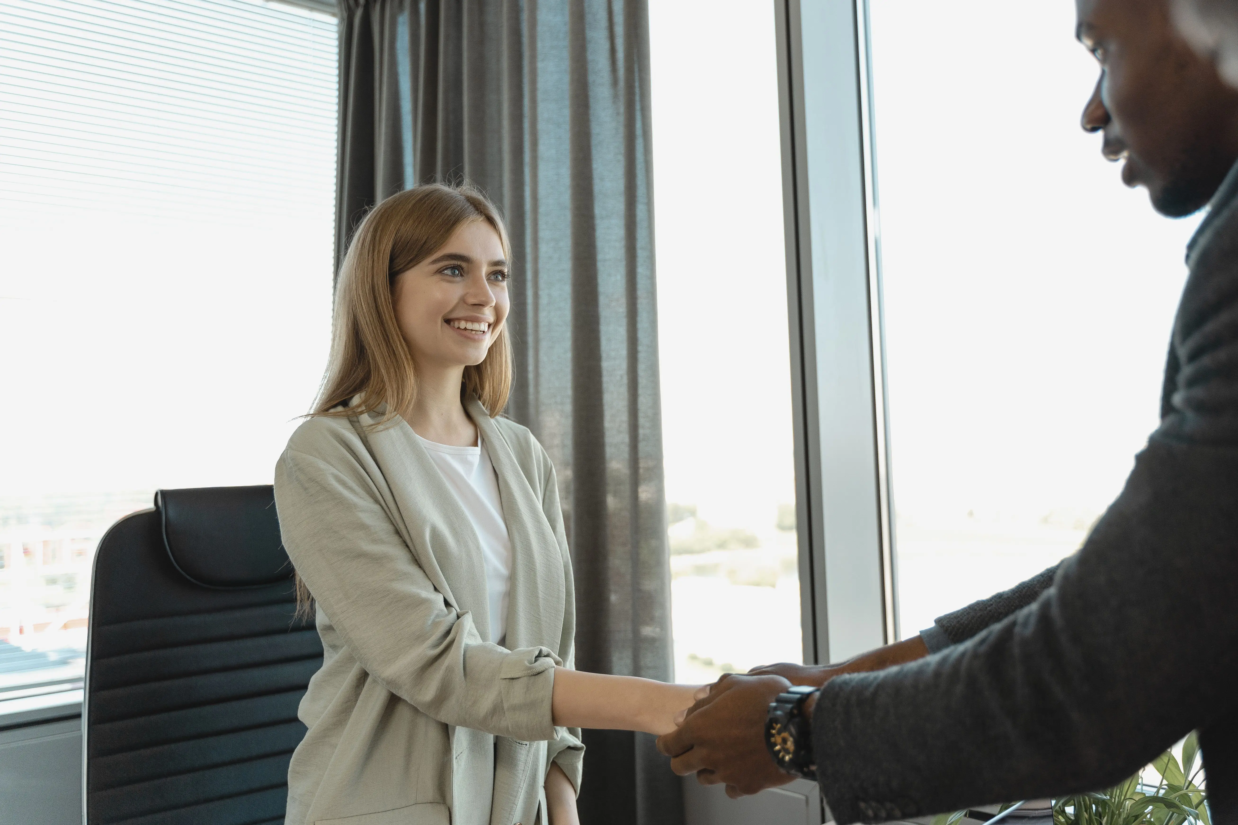 Job applicant confidently answering difficult interview questions